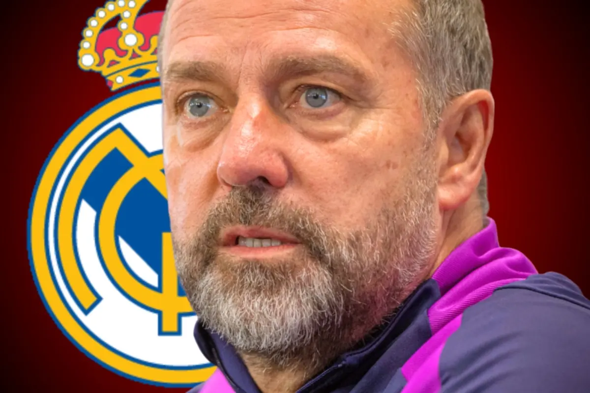 Bearded man in a sports jacket in the foreground with the Real Madrid crest in the background