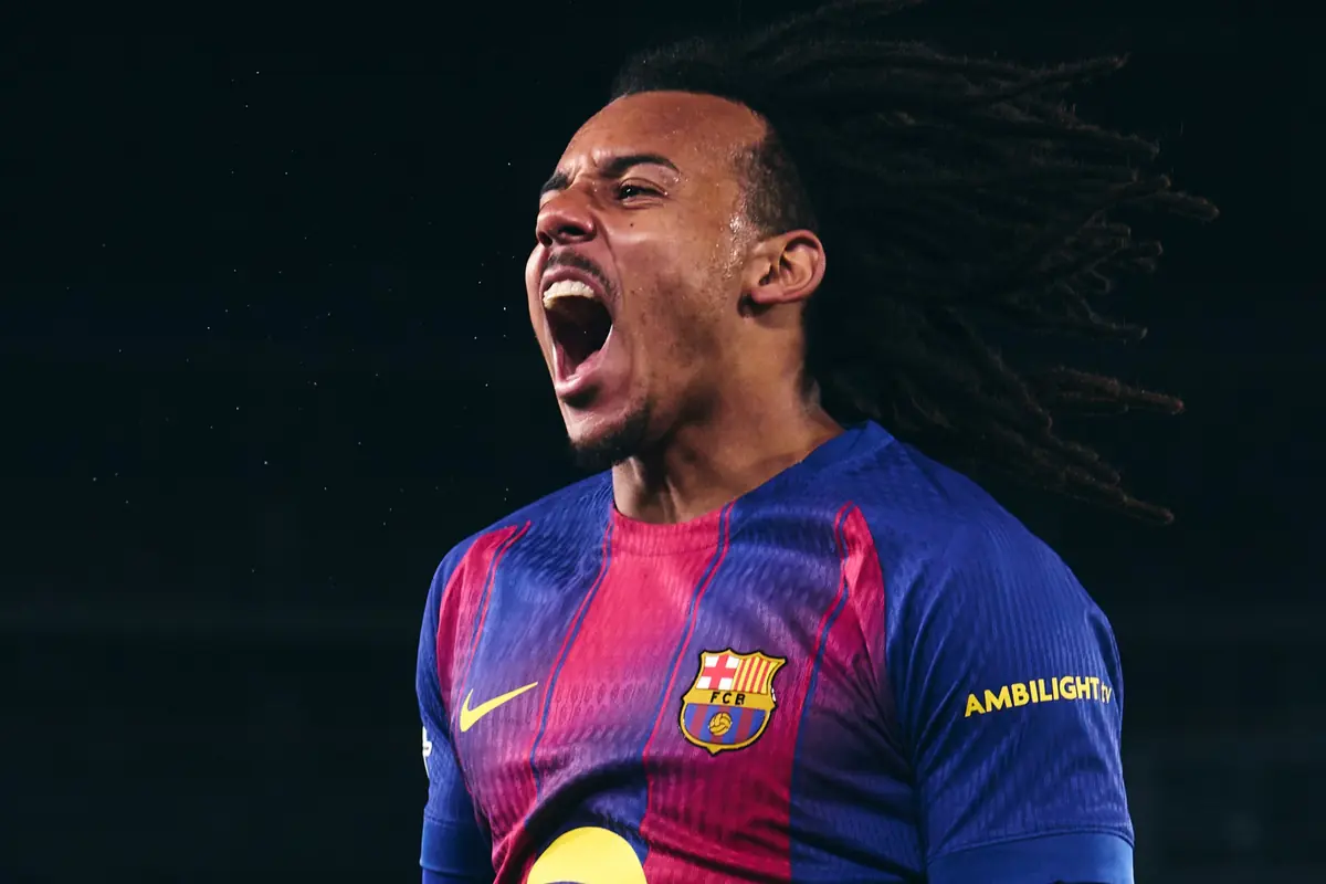 Futbolista con camiseta del Barcelona celebrando con expresión de euforia