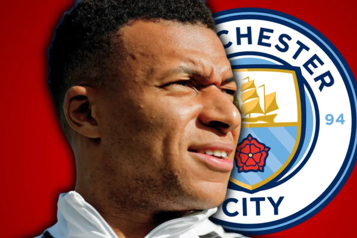 A player in a white jacket appears in the foreground with the Manchester City crest in the background against a red backdrop.