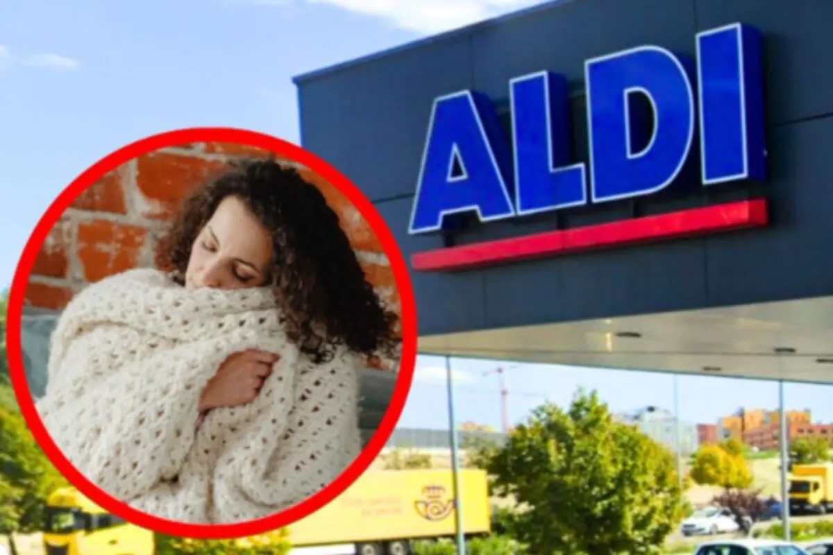 Fachada de una tienda Aldi con un círculo que muestra a una mujer abrazada a una manta tejida de color claro.