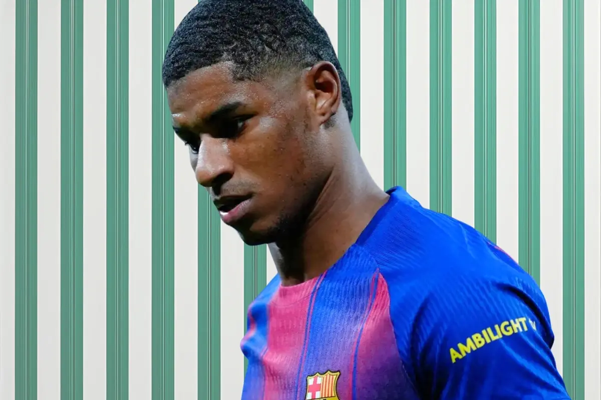 Soccer player wearing Barcelona’s blue and red jersey against a background of green and white stripes