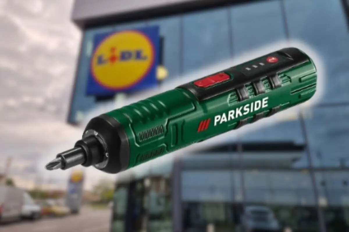 Green Parkside electric screwdriver in the foreground with a blurred Lidl supermarket in the background Green Parkside electric screwdriver in the foreground with a blurred Lidl supermarket in the background