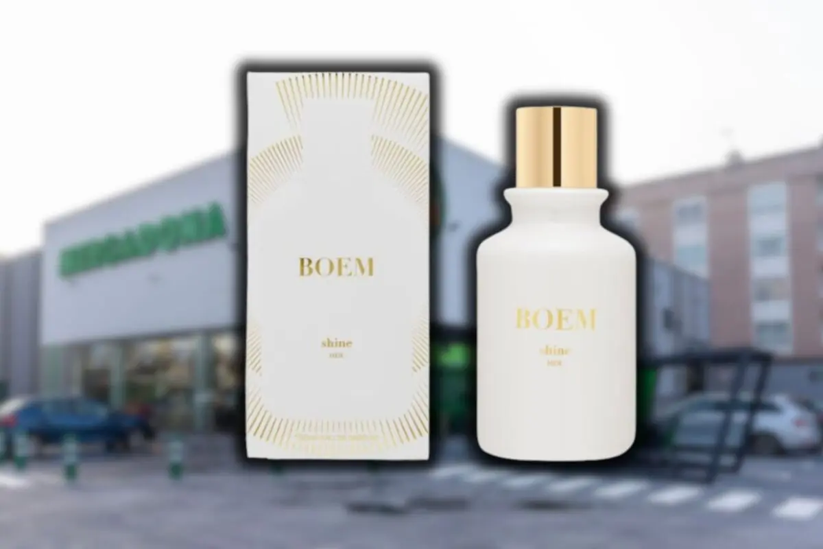 Perfume Boem Shine Her con su caja blanca y dorada sobre un fondo desenfocado de supermercado Mercadona