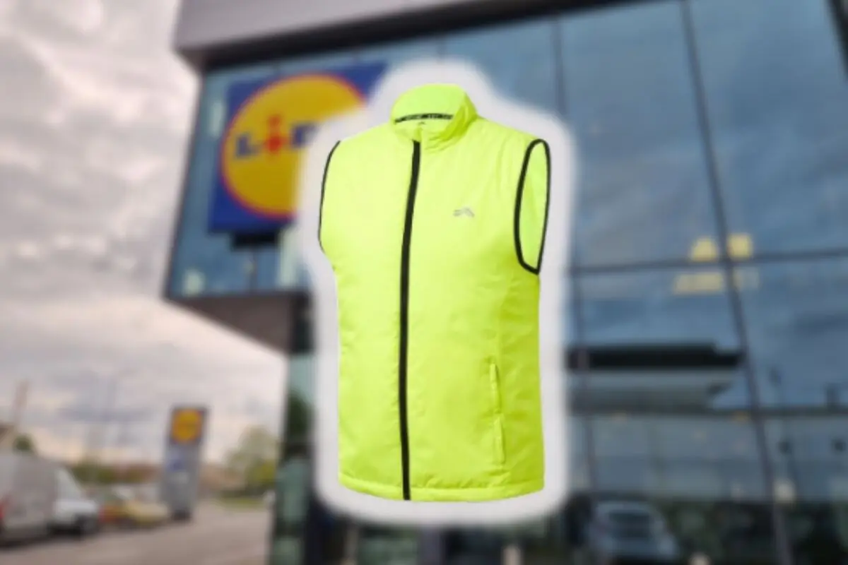 Sleeveless yellow reflective vest standing out in front of the blurred façade of a Lidl supermarket