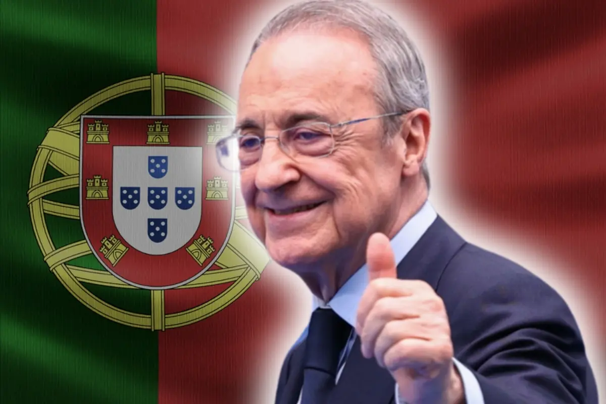 Hombre mayor con traje y gafas levantando el pulgar delante de una gran bandera de Portugal