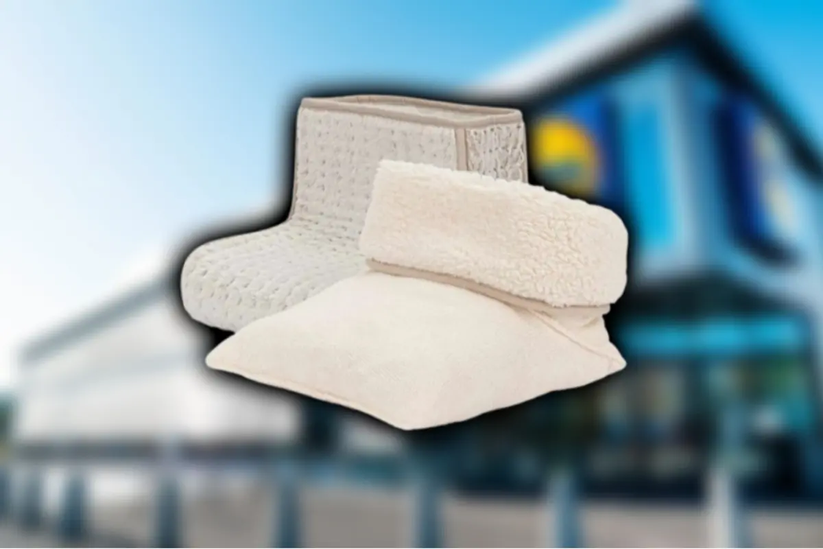 Reading pillow and soft knit blanket in beige tones against a blurred background of a store building Reading pillow and soft knit blanket in beige tones against a blurred background of a store building