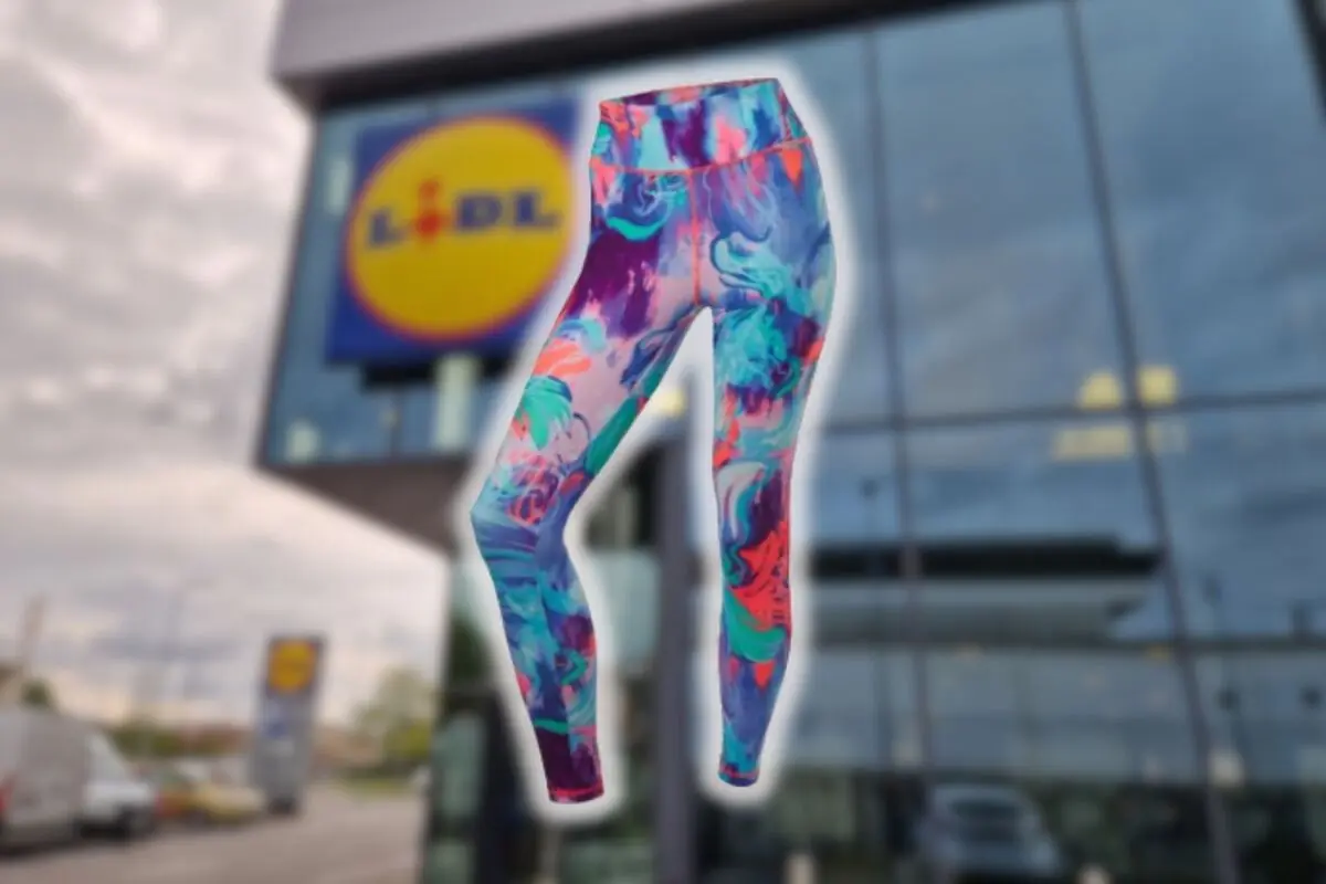 Colorful abstract print sports leggings in front of a blurred Lidl supermarket façade