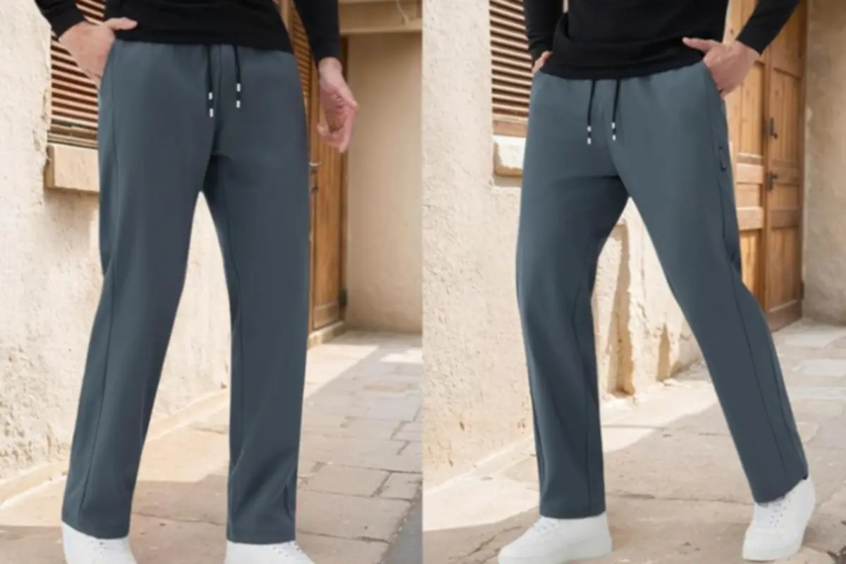 Pantalón deportivo azul grisáceo para hombre con cordón ajustable y corte recto combinado con zapatillas blancas en un entorno urbano exterior