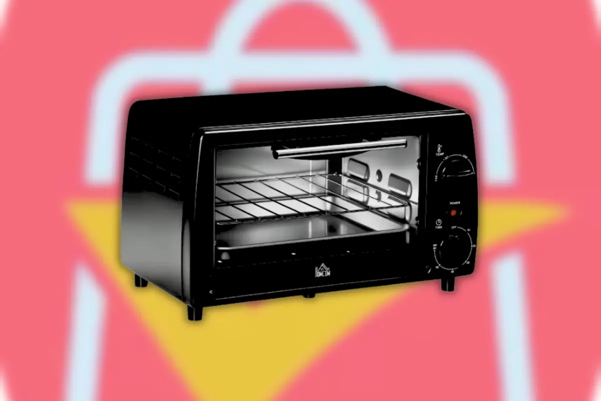 Montaje con horno eléctrico negro sobre el fondo del logotipo de AliExpress desenfocado