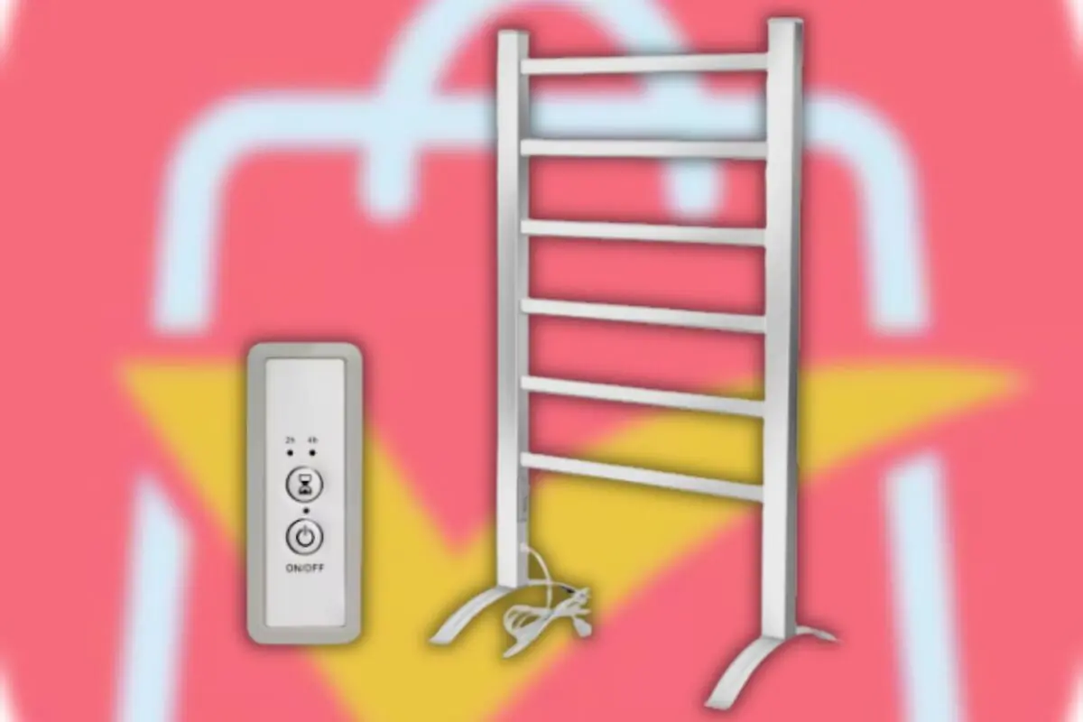 Toallero eléctrico blanco con mando a distancia sobre fondo rosa y amarillo Toallero eléctrico blanco con mando a distancia sobre fondo rosa y amarillo