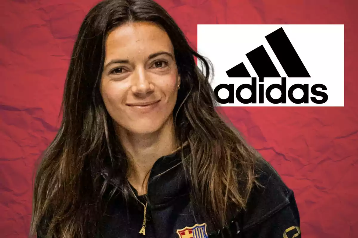 Woman wearing an FC Barcelona jacket smiles in front of a red background with the Adidas logo next to her.