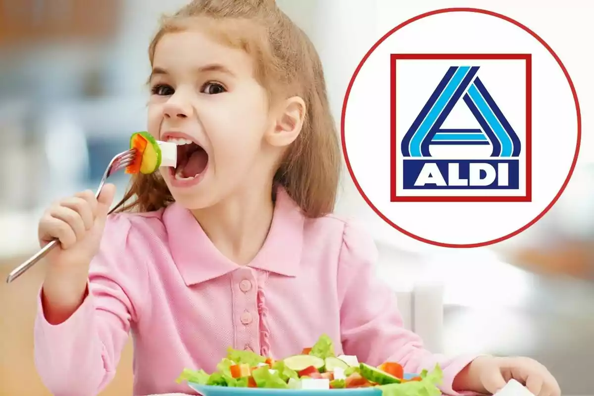 Nena menjant amanida amb un logotip d'Aldi al costat.