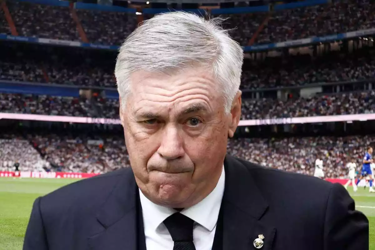 Carlo Ancelotti mossegant-se el llavi amb el Bernabéu de fons