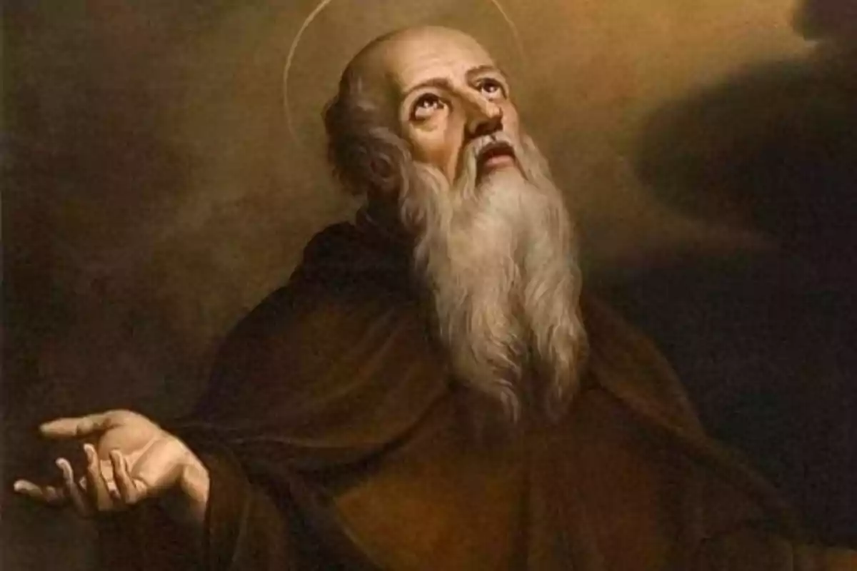 Pintura d’un home ancià amb barba llarga i túnica marró mirant cap amunt amb una expressió de devoció i un halo sobre el cap. Pintura d’un home ancià amb barba llarga i túnica marró mirant cap amunt amb una expressió de devoció i un halo sobre el cap.