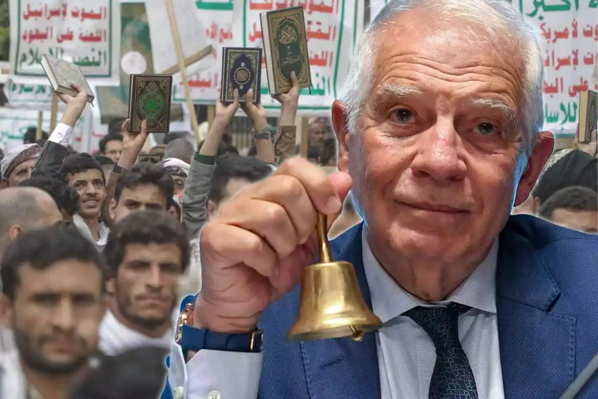 Pla mitjà de Josep Borrell amb una campana petita a la mà i de fons una protesta de musulmans alçant un alcorà