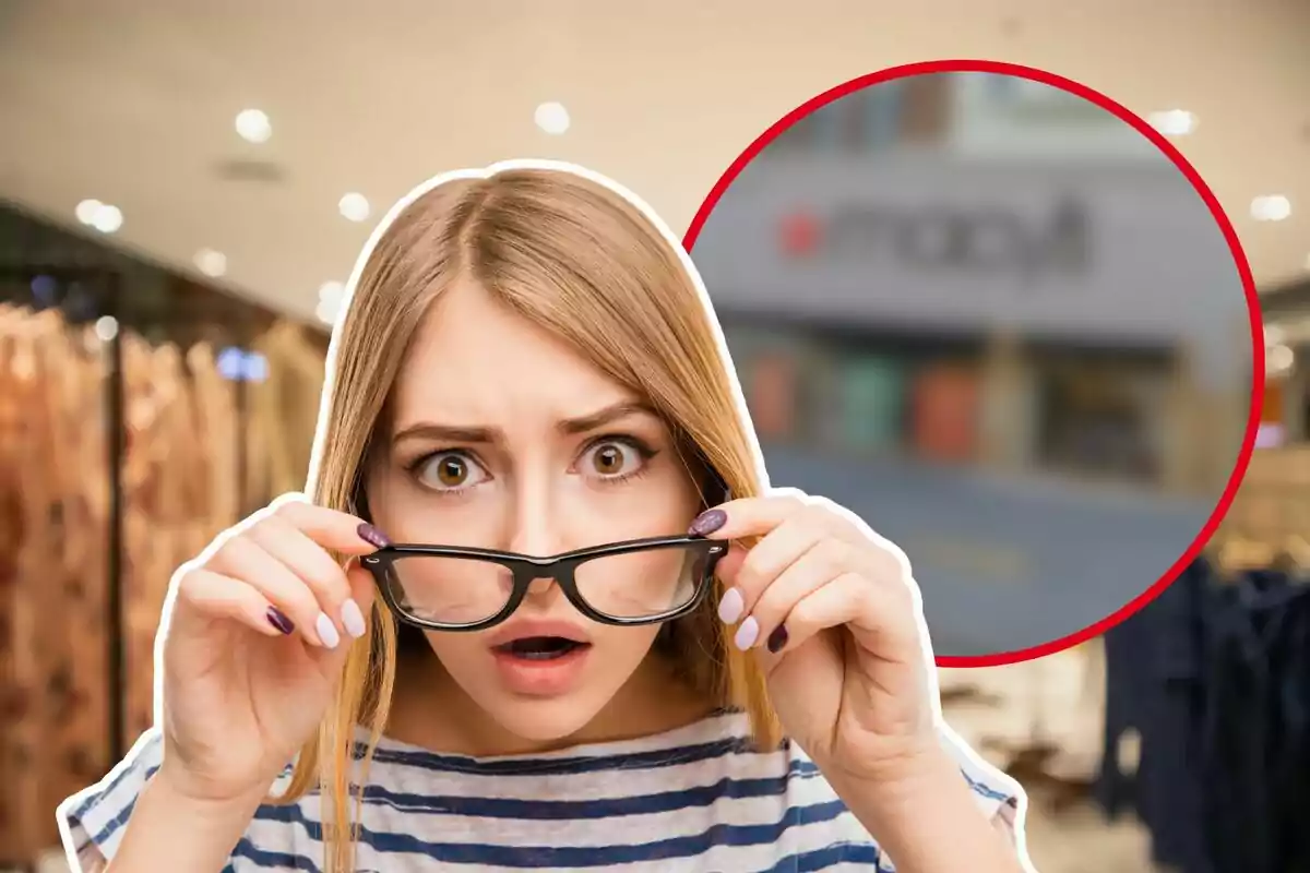 A surprised woman adjusts her glasses in a store with a blurry sign in the background.