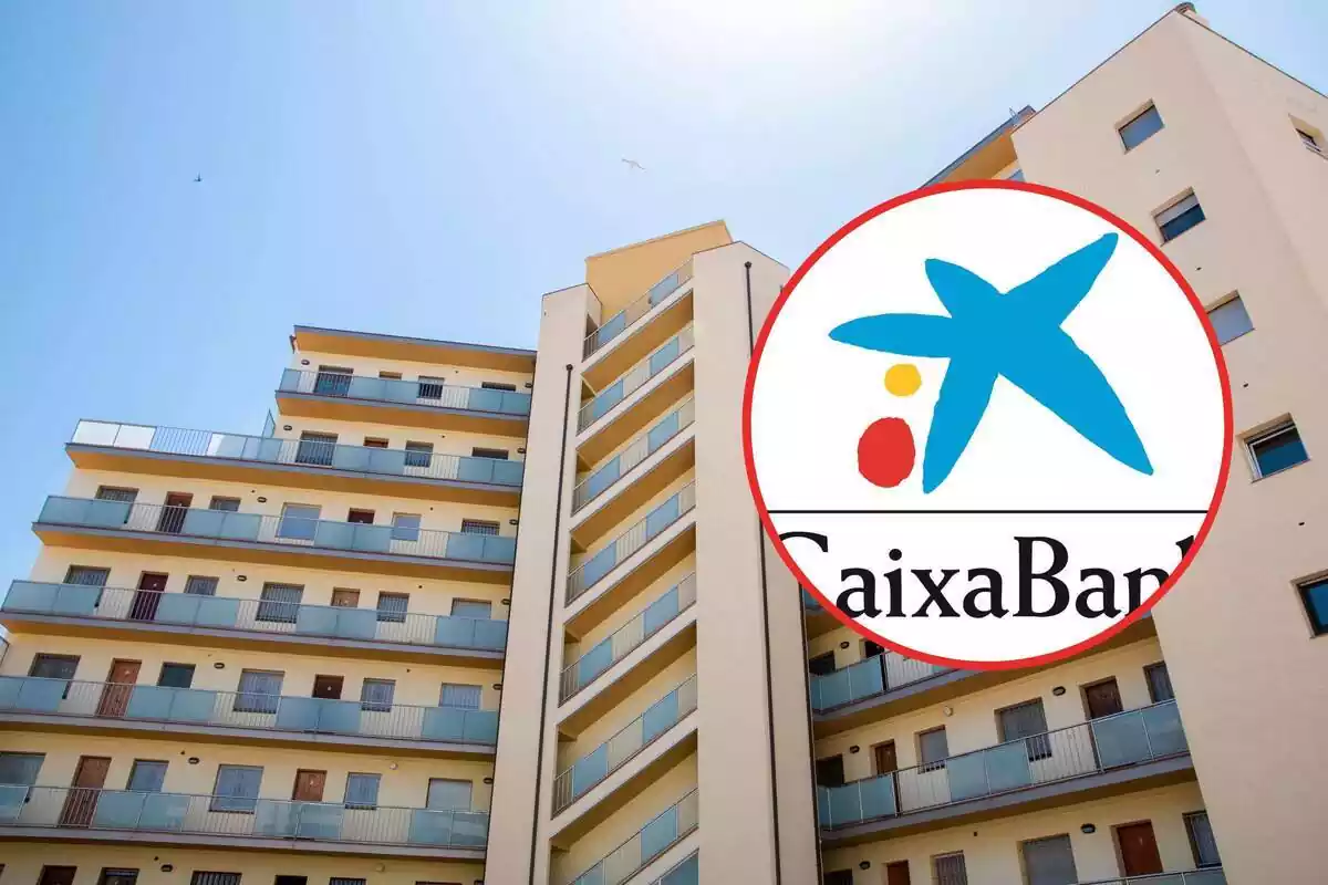 Installing the CaixaBank logo on the exterior of a group of apartments