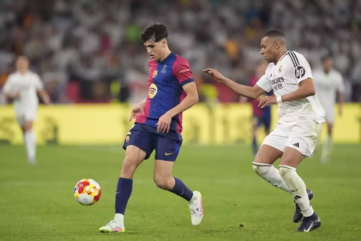 Two players in action during a match, one in a blue and red uniform and the other in a white uniform, while the ball is in the air. Two players in action during a match, one in a blue and red uniform and the other in a white uniform, while the ball is in the air.