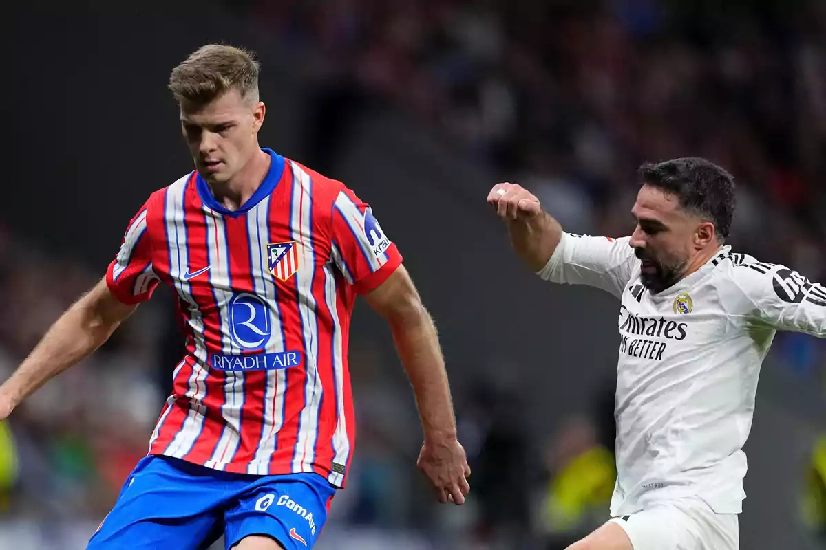 Two soccer players in action during a match, one wearing a red and white striped uniform and the other wearing a white uniform.