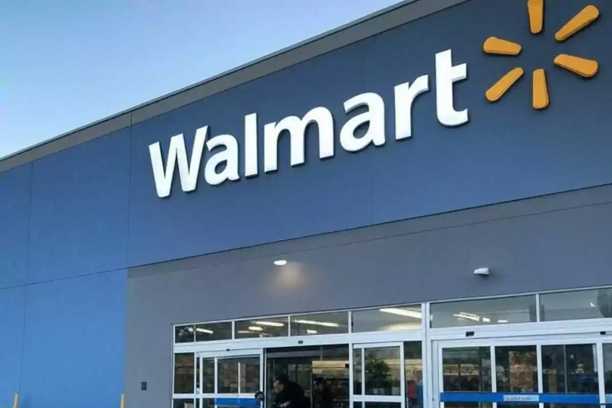 Store entrance with the Walmart logo on the facade. Store entrance with the Walmart logo on the facade.