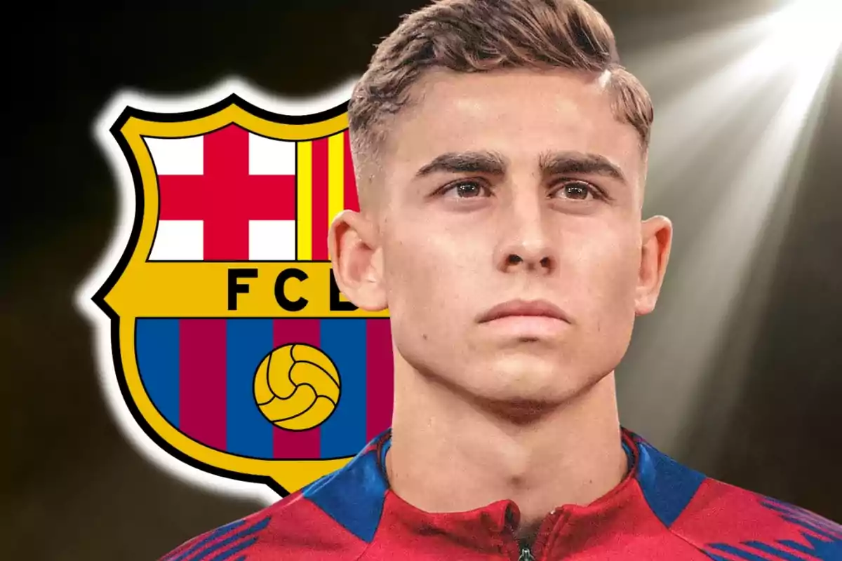 A player in the FC Barcelona uniform with the club's crest in the background.