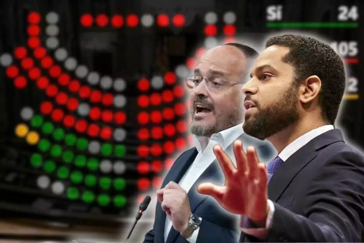 Two men debate in a parliament with a voting board in the background displaying red, green, yellow, and white lights alongside the results of a vote.