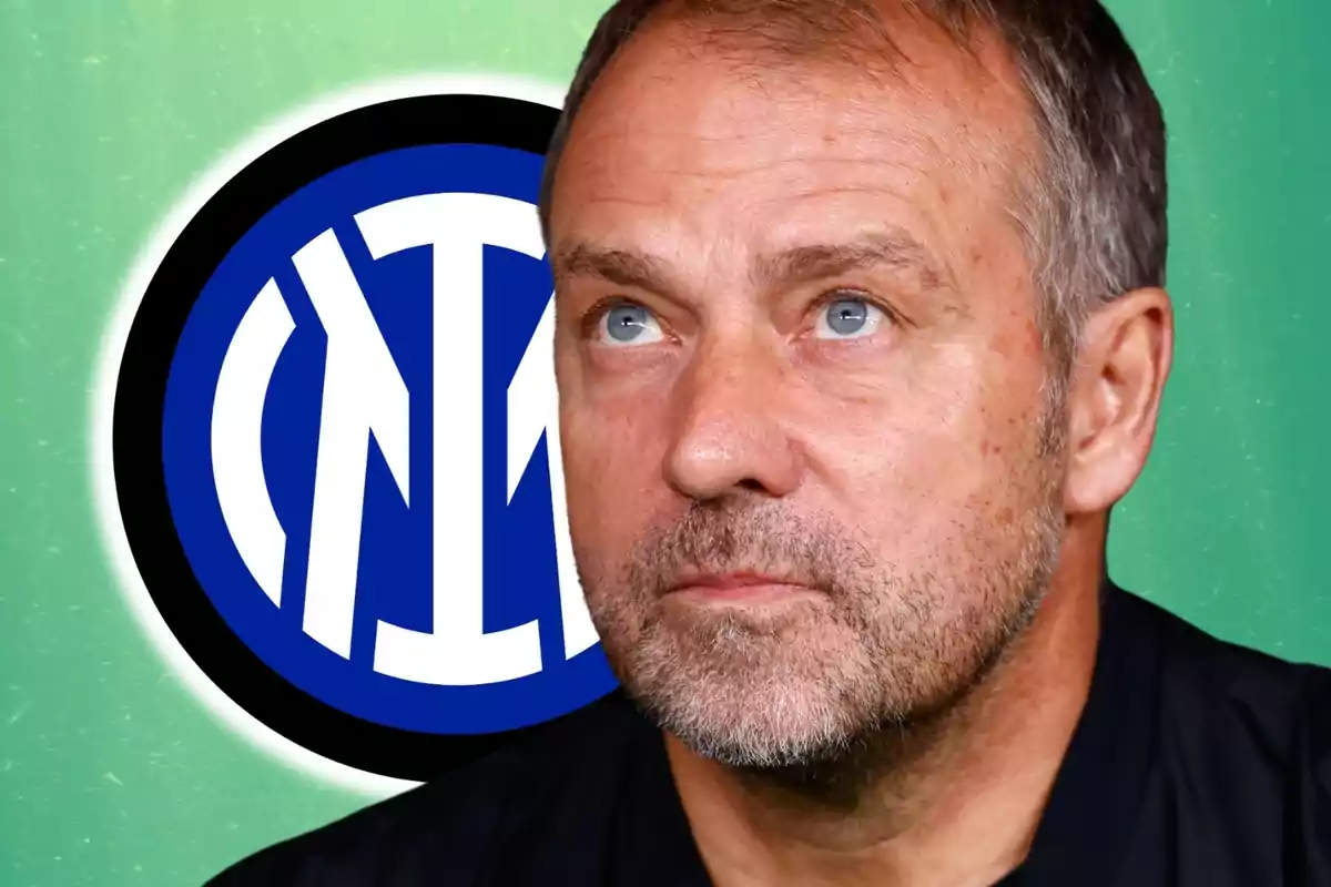 A man looking up with the Inter Milan logo in the background.