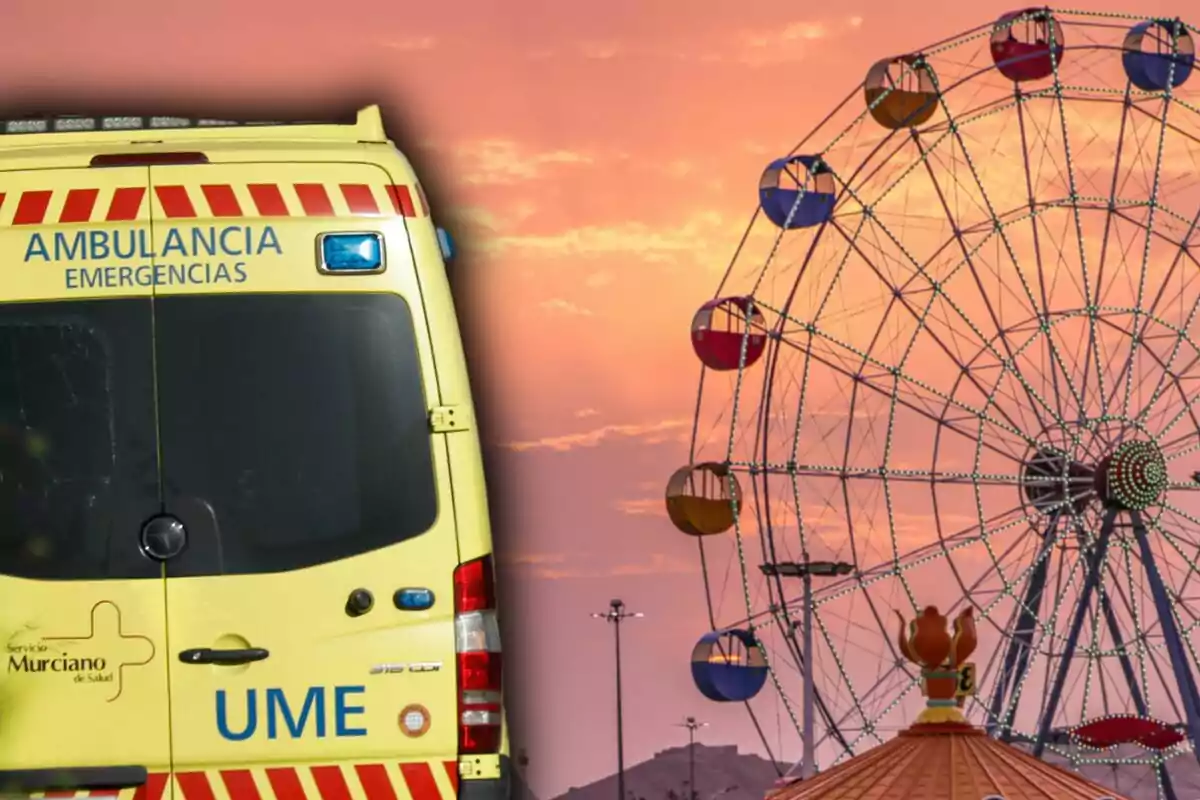 Ambulància d’emergències estacionada al costat d’una roda de fira en una fira al capvespre