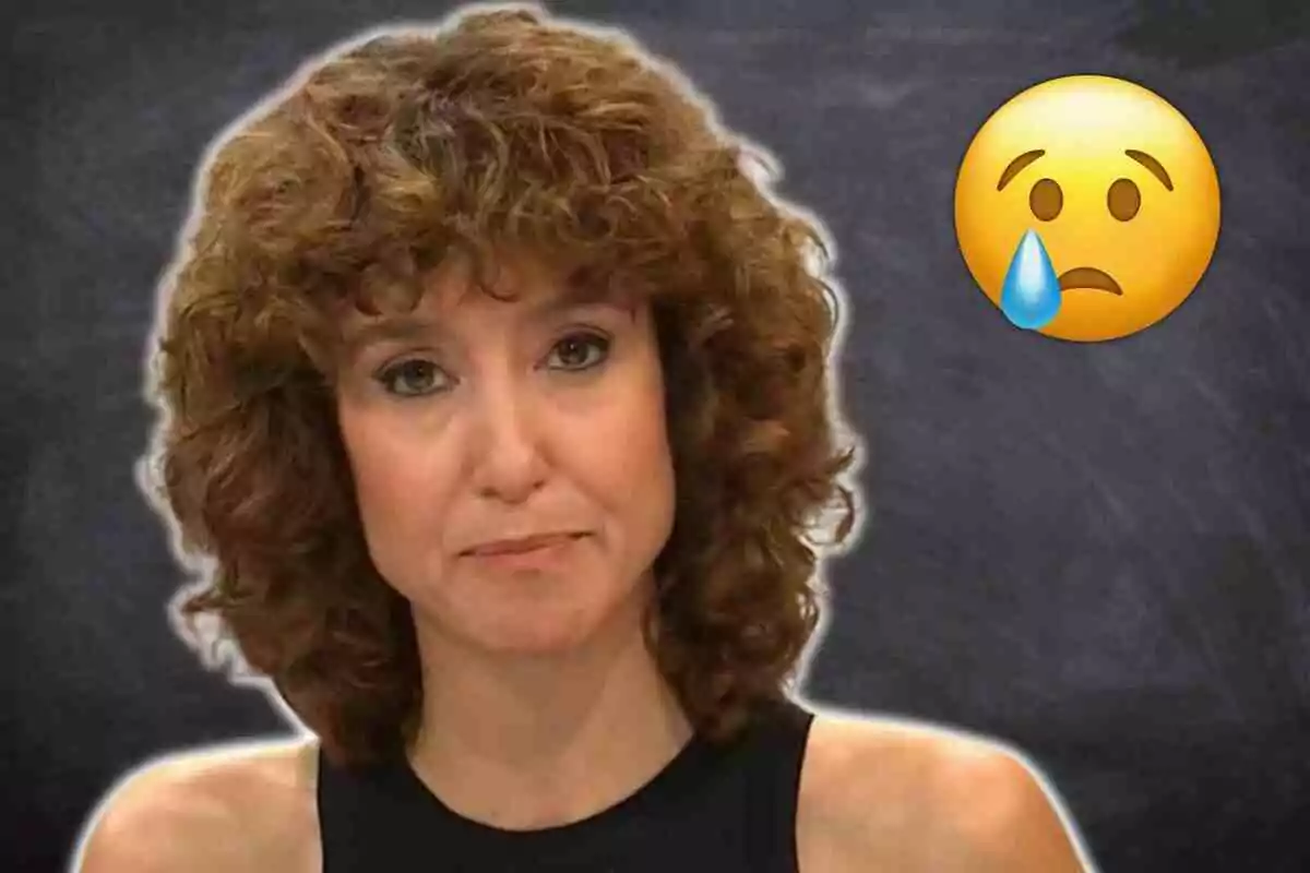 Agnès Marquès amb expressió trista al costat d'un emoji plorant sobre un fons fosc.