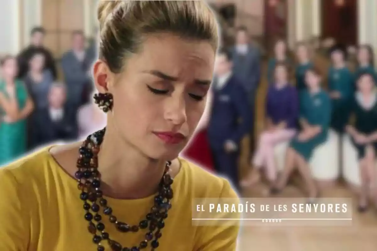 A woman with a pensive expression and closed eyes, wearing a beaded necklace and a yellow dress, with a group of blurred people in the background and the text "El Paradís de les Senyores" in the bottom right corner.