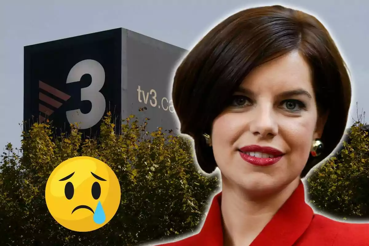 Dona amb expressió seriosa davant d'un edifici de TV3 i un emoji trist.