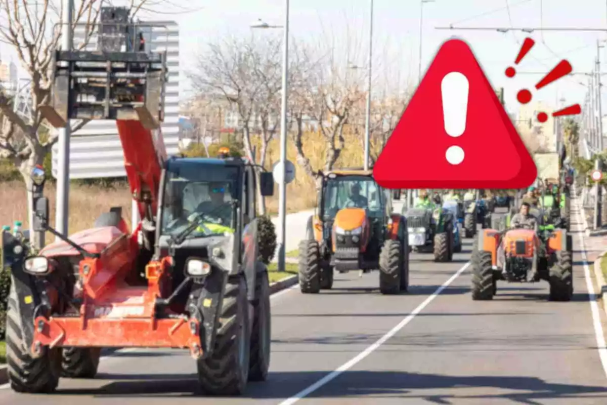 A line of tractors drives down an urban road, with a warning symbol overlaid on the image.