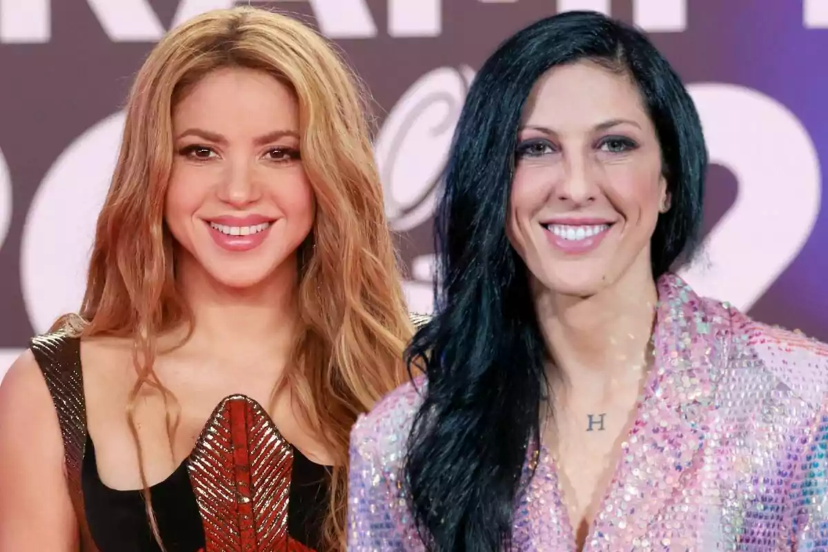 Two smiling women pose together at an event with a blurred background.