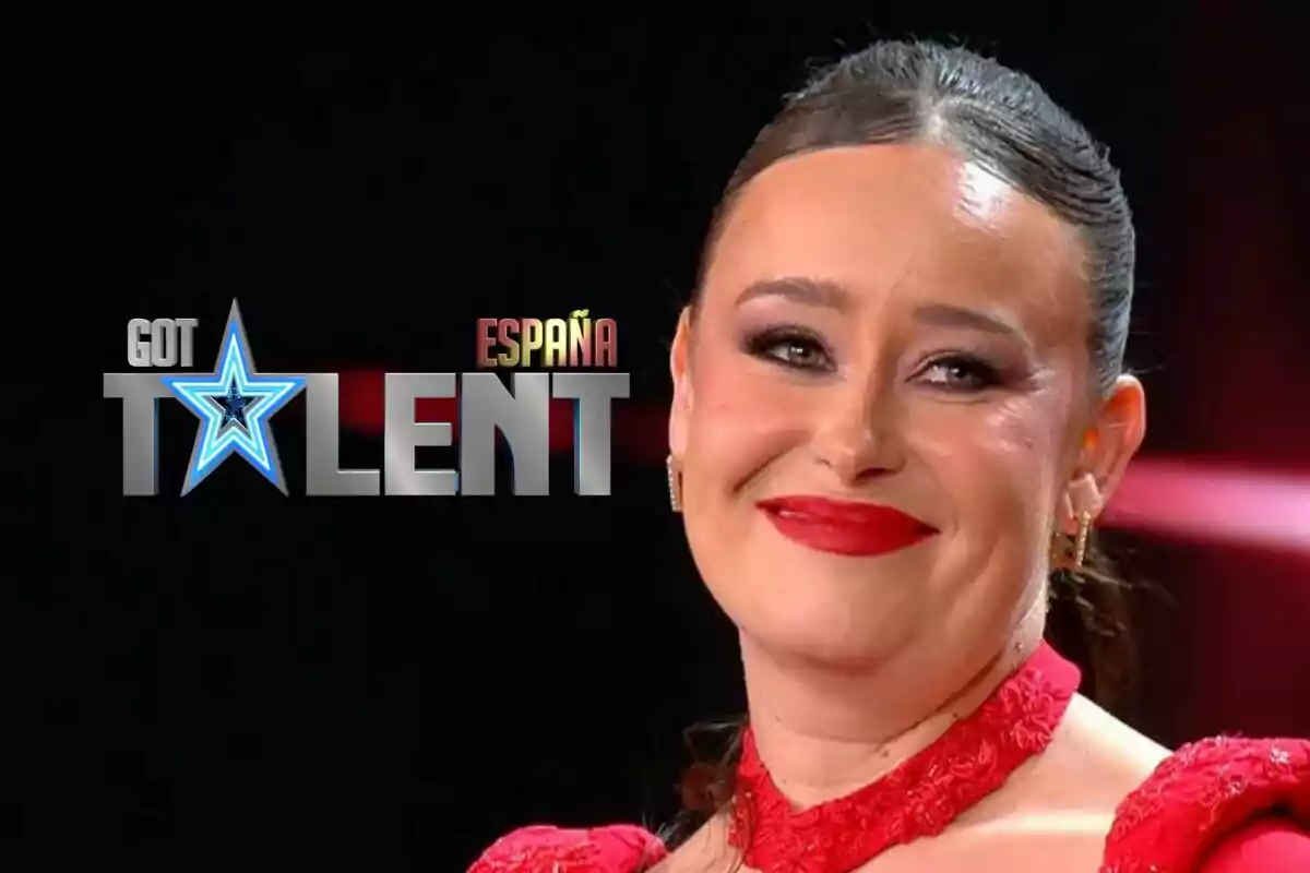 Nataliya Stepanska somrient amb maquillatge cridaner i vestit vermell apareix en un programa de televisió anomenat "Got Talent España".