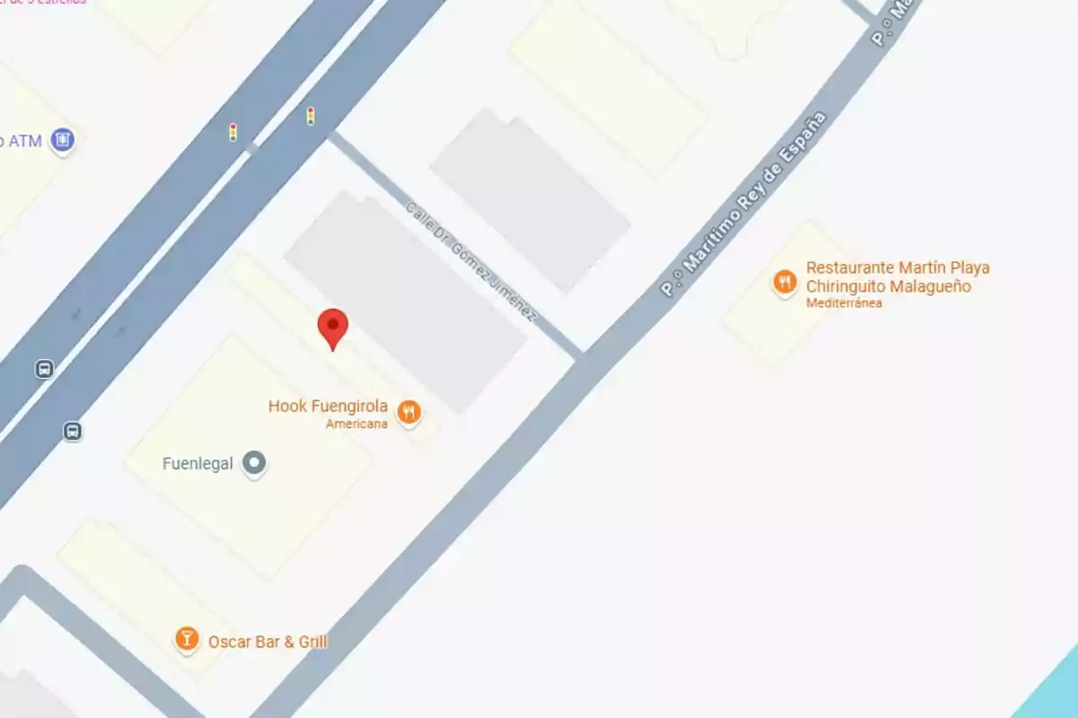 Mapa d’una zona a Fuengirola on es mostren ubicacions de restaurants i negocis com Hook Fuengirola, Restaurant Martín Playa, Oscar Bar & Grill i Fuenlegal, al costat dels carrers Passeig Marítim Rei d’Espanya i Carrer Dr. Gómez Jiménez. Mapa d’una zona a Fuengirola on es mostren ubicacions de restaurants i negocis com Hook Fuengirola, Restaurant Martín Playa, Oscar Bar & Grill i Fuenlegal, al costat dels carrers Passeig Marítim Rei d’Espanya i Carrer Dr. Gómez Jiménez.