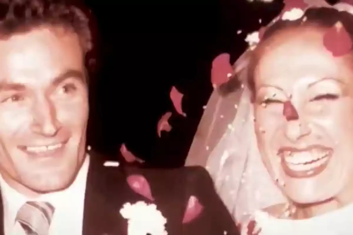 Amador Mohedano and Rosa Benito at their wedding, surrounded by flower petals. Amador Mohedano and Rosa Benito at their wedding, surrounded by flower petals.