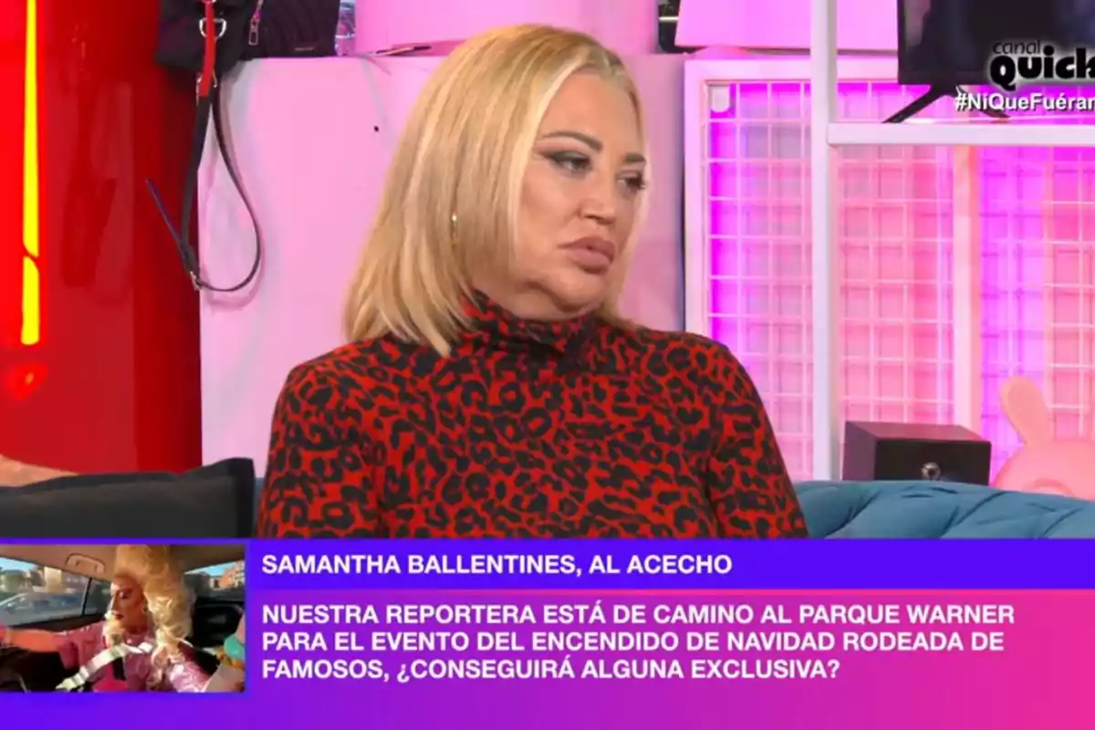 Belén Esteban amb cabells rossos i suèter d'estampat animal està asseguda a 'Ni que fuéramos' amb llums rosades i decoració moderna. A la cantonada inferior esquerra, hi ha un requadre amb text que esmenta una reportera en camí a un esdeveniment nadalenc al Parc Warner. Belén Esteban amb cabells rossos i suèter d'estampat animal està asseguda a 'Ni que fuéramos' amb llums rosades i decoració moderna. A la cantonada inferior esquerra, hi ha un requadre amb text que esmenta una reportera en camí a un esdeveniment nadalenc al Parc Warner.