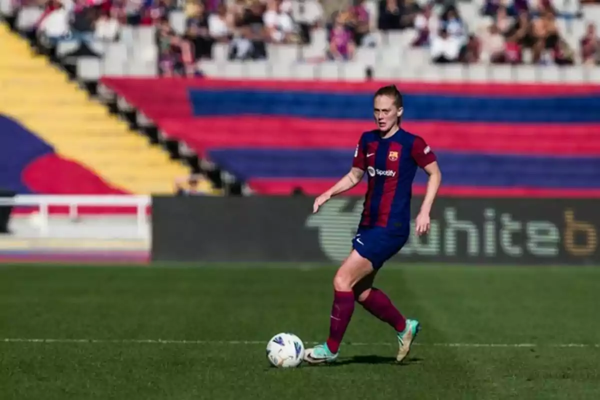 FC Barcelona female soccer player in action during a match on the field.