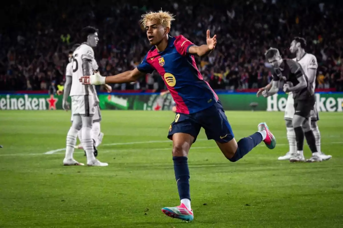 A player celebrating a goal in a match wearing the FC Barcelona uniform while the opposing team's players are in the background. A player celebrating a goal in a match wearing the FC Barcelona uniform while the opposing team's players are in the background.