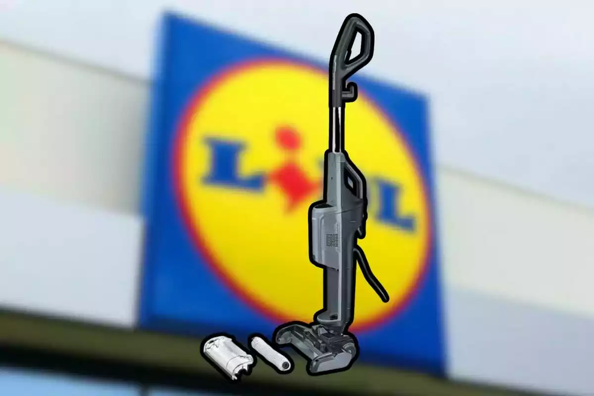 A black vacuum cleaner with accessories in front of a blurry store sign. A black vacuum cleaner with accessories in front of a blurry store sign.