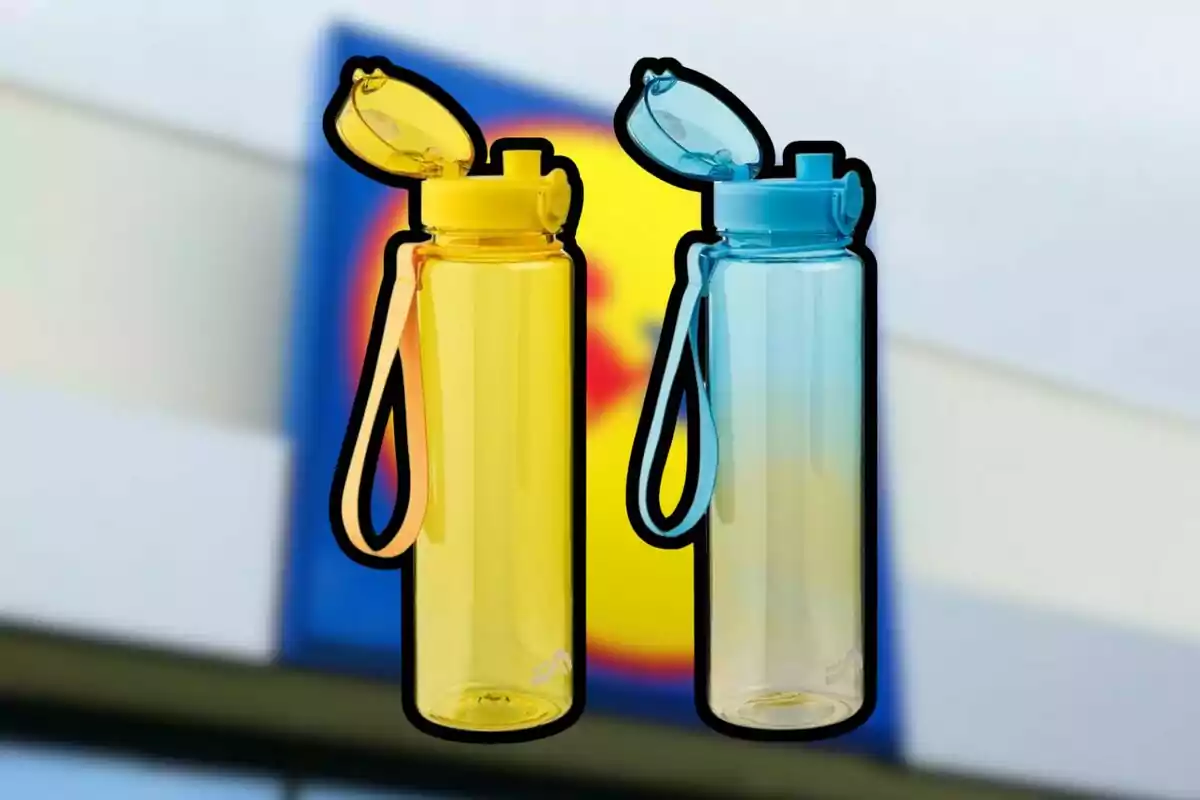 Two reusable plastic bottles, one yellow and one blue, with flip-top lids and handles, against a blurred background of a supermarket sign. Two reusable plastic bottles, one yellow and one blue, with flip-top lids and handles, against a blurred background of a supermarket sign.