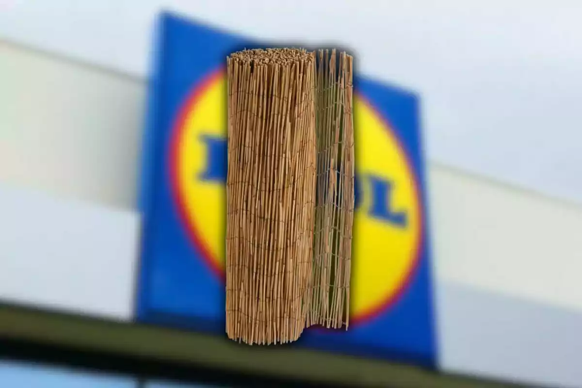 A roll of bamboo canes in front of a blurry sign in the background. A roll of bamboo canes in front of a blurry sign in the background.