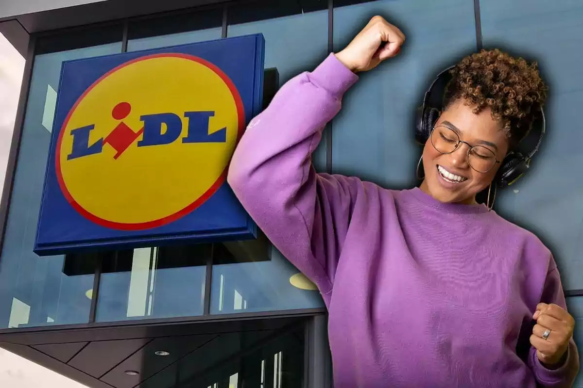 Una persona amb auriculars i suèter morat somriu i aixeca el puny davant d'un edifici amb el logo de Lidl.