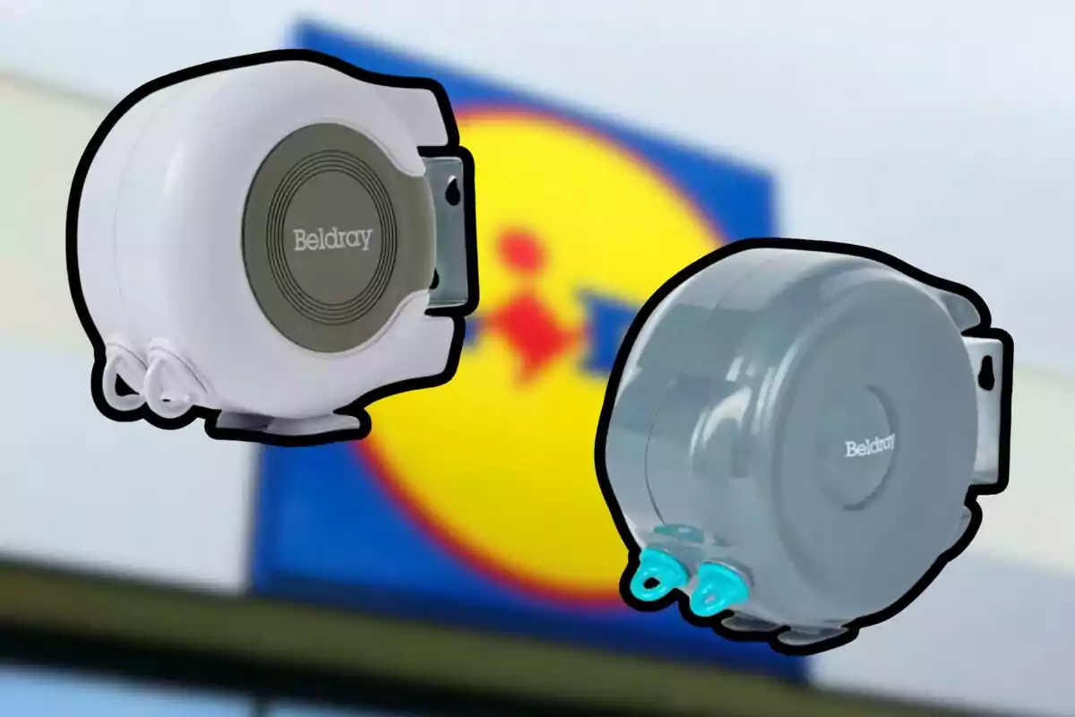Two Beldray brand retractable clothesline dispensers, one white and one gray, with a supermarket logo blurred in the background. Two Beldray brand retractable clothesline dispensers, one white and one gray, with a supermarket logo blurred in the background.