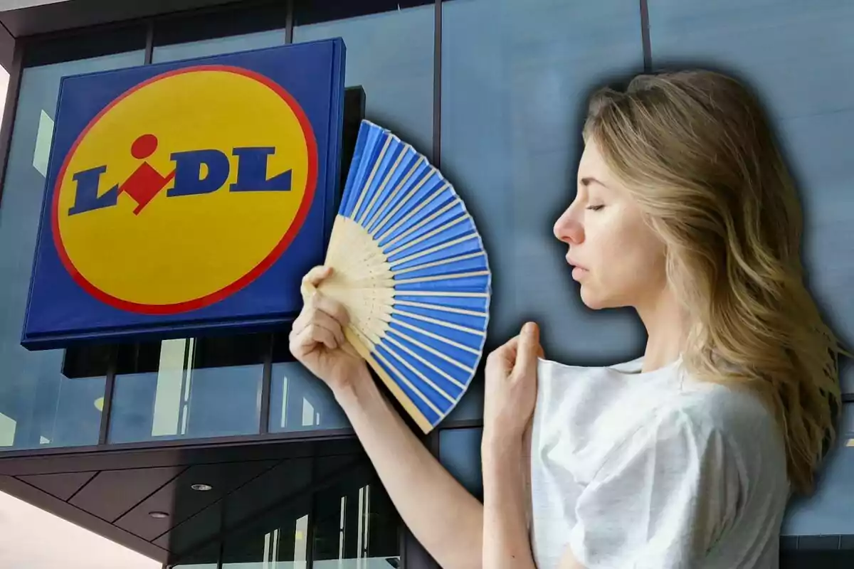 Una dona fent servir un ventall davant d'un edifici amb el logotip de Lidl.