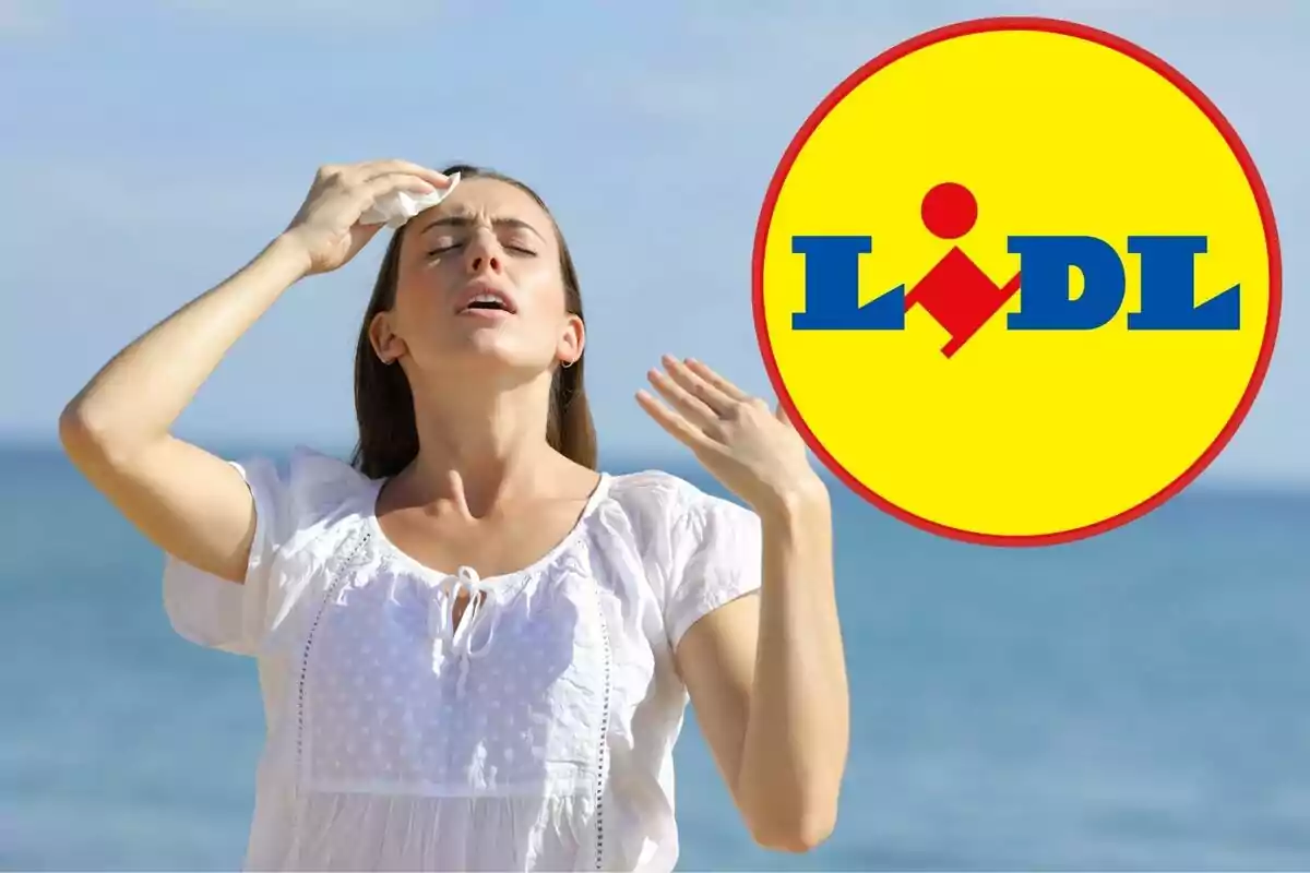 Dona a la platja assecant-se la suor amb un mocador al costat del logo de Lidl.