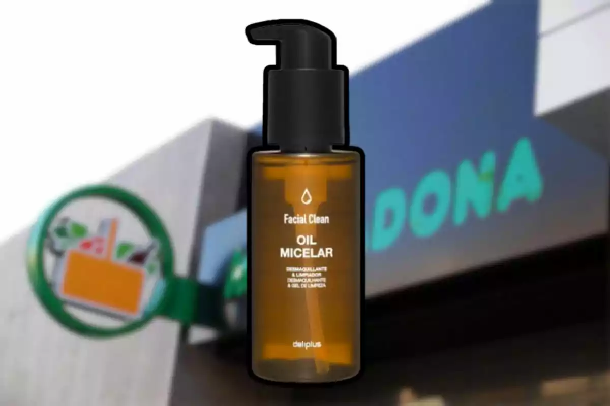 Micellar cleansing oil bottle in front of a supermarket sign. Micellar cleansing oil bottle in front of a supermarket sign.
