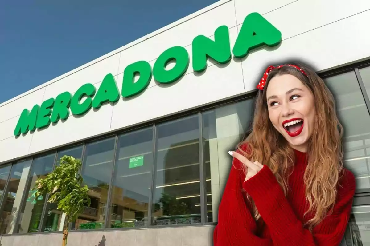 A smiling woman in a red sweater and red polka dot headband points to a building with a Mercadona sign.