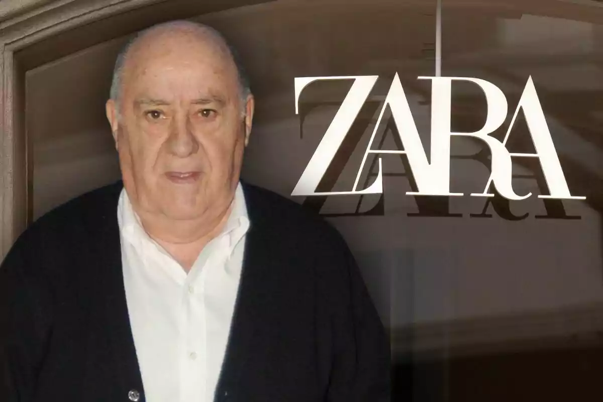 Un hombre mayor con camisa blanca y suéter oscuro frente a un letrero de Zara.