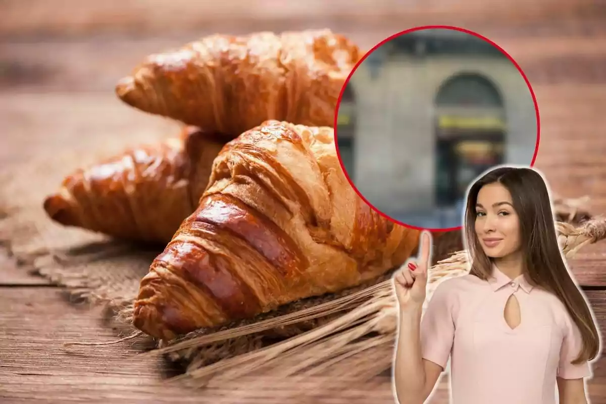 Una dona assenyalant cap a un grup de croissants sobre una superfície de fusta.